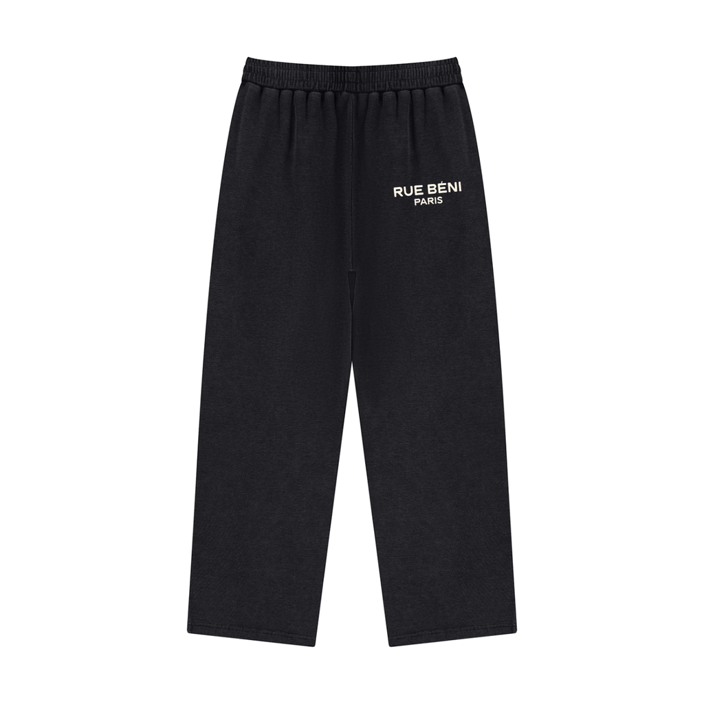 Black pants with a logo on the pocket against a white background