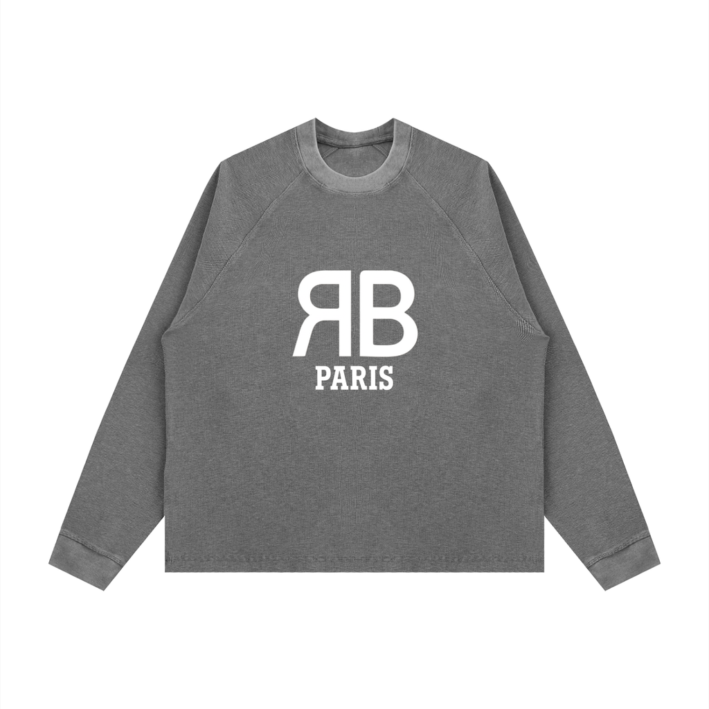 A black long-sleeve crewneck sweatshirt featuring a grayscale chest X-ray graphic of a cross on the front, with the text 'It Takes Me My Heart' and 'Hermano Jairo' printed below, shown on a plain white background.