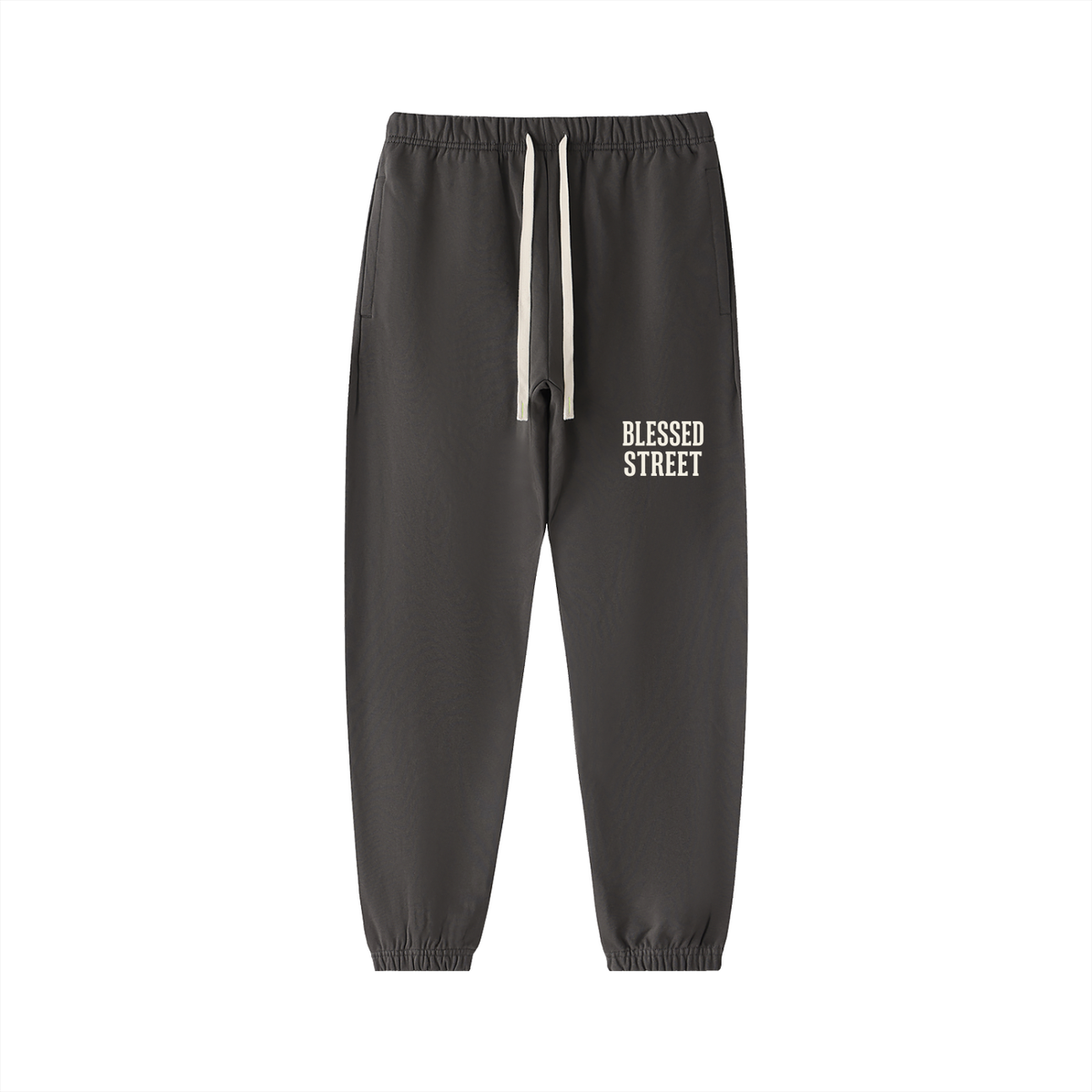 Dark gray jogger pants with a white drawstring and 'BLESSED STREET' printed in white on the left thigh, shown against a plain white background.