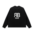 A black long-sleeve crewneck sweatshirt featuring a grayscale chest X-ray graphic of a cross on the front, with the text 'It Takes Me My Heart' and 'Hermano Jairo' printed below, shown on a plain white background.